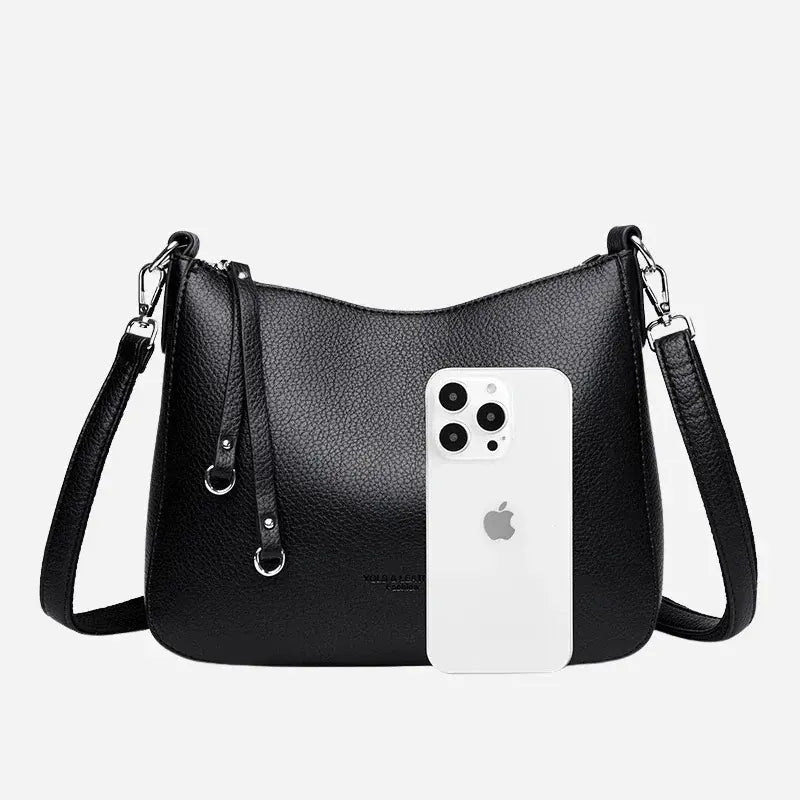 Bolsa-Feminina-Transversal-Hobo-Adele-Modelo-Preta-Couro-Frente--bolsa-hobo-pequena-bolsa-hobo-preta-bolsa-hobo-couro-durabilidade-sofisticacao