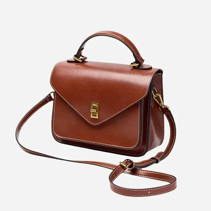 Bolsa-de-Mao-Feminina-Arielle-Marrom-Alca-Para-Frente-bolsa-feminina-promoção-bolsa-de-couro-feminina-bolsa-tiracolo-bolsa-tiracolo-feminino-bolsa-tiracolo-feminina-bolsa-de-couro-feminina-bolsa-de-mao-bolsa de-mao-viagem-bolsa-de-mao-festa-bolsa pequena-bolsa-pequena-feminino-bolsa-pequena-feminina-transversal