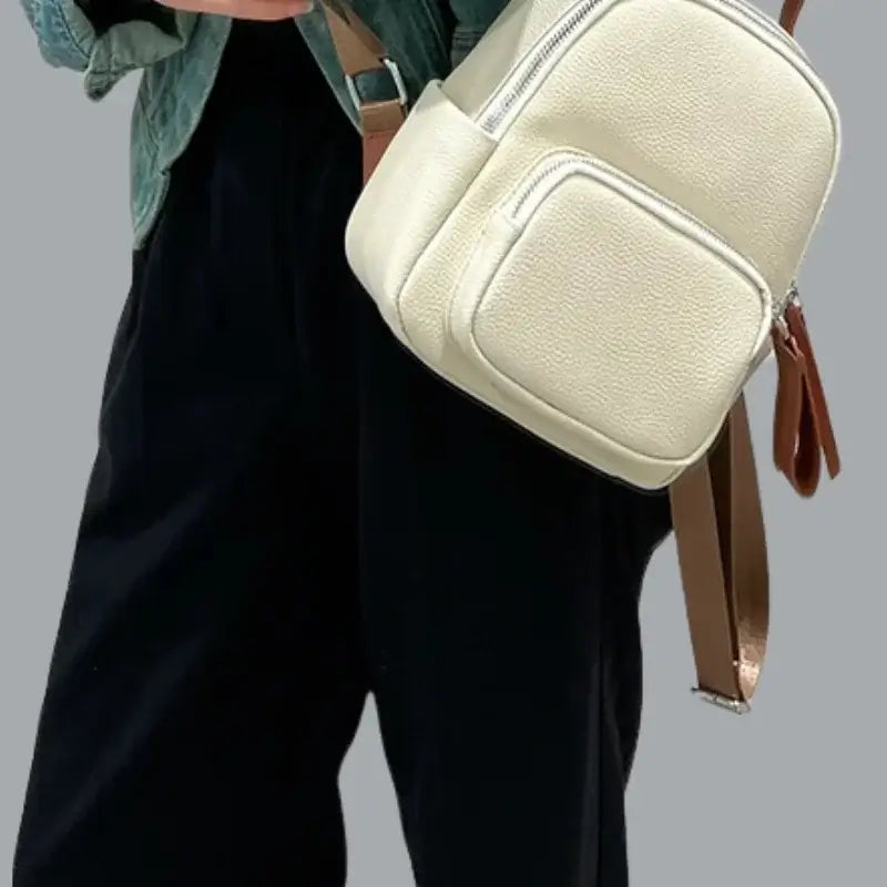 Mochila-Feminina-de-Couro-Noelle-Branca-Modelo-bolsa-mochila-feminina-bolsa-mochila-feminina-couro-bolsa-mochila-feminina-de-couro-bolsa-mochila-feminina-pequena-bolsa-mochila-feminina-em-promoção-bolsa-mochila-feminina-preta
